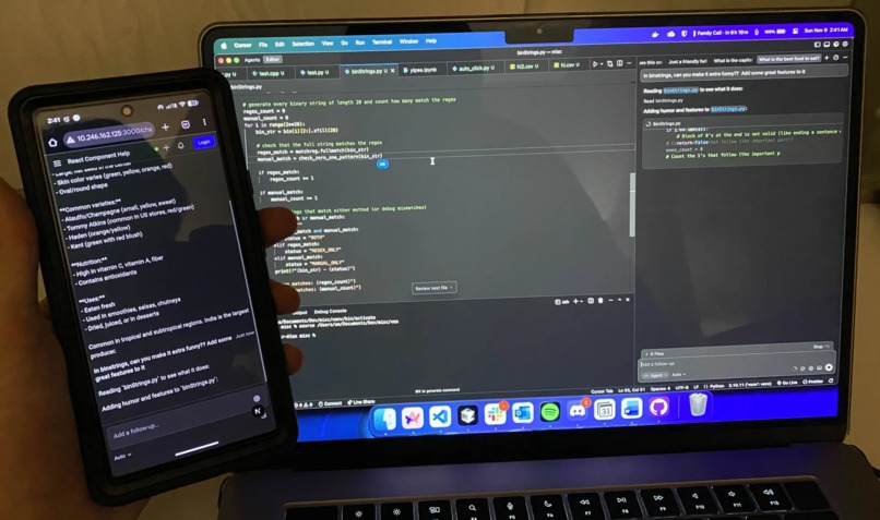 Cursor on the Go running on a phone beside a laptop