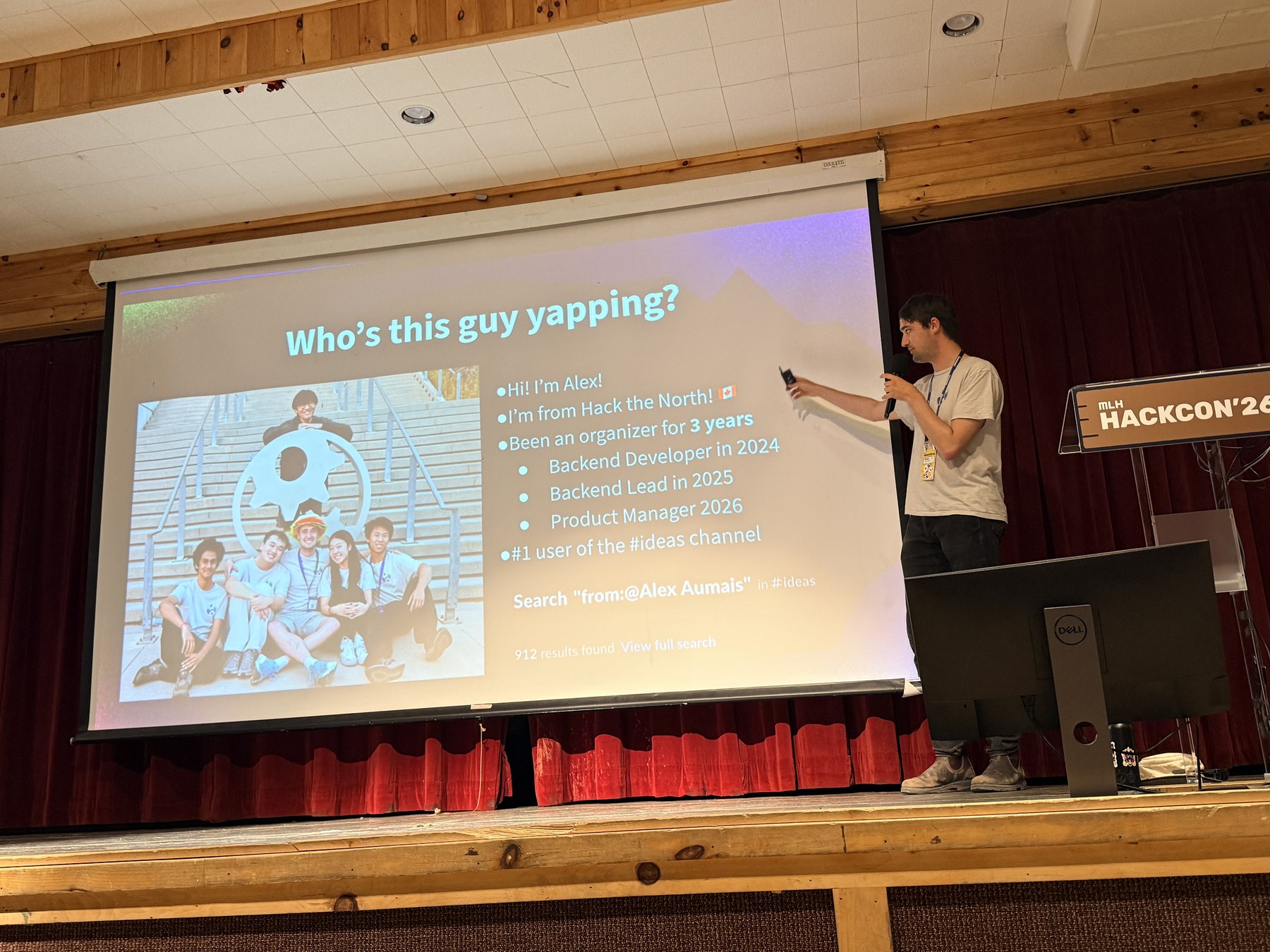 Alex Aumais introducing himself and his Hack the North experience onstage at Hackcon 2026
